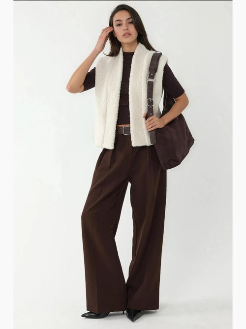 Gilet texturé sans manches à col hiccup - Kiabi Gilet texturé sans manches à col hiccup - Kiabi