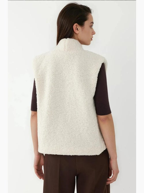 Gilet texturé sans manches à col hiccup - Kiabi Gilet texturé sans manches à col hiccup - Kiabi