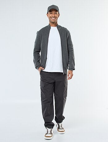 Gilet uni en maille avec 2 poches et col montant