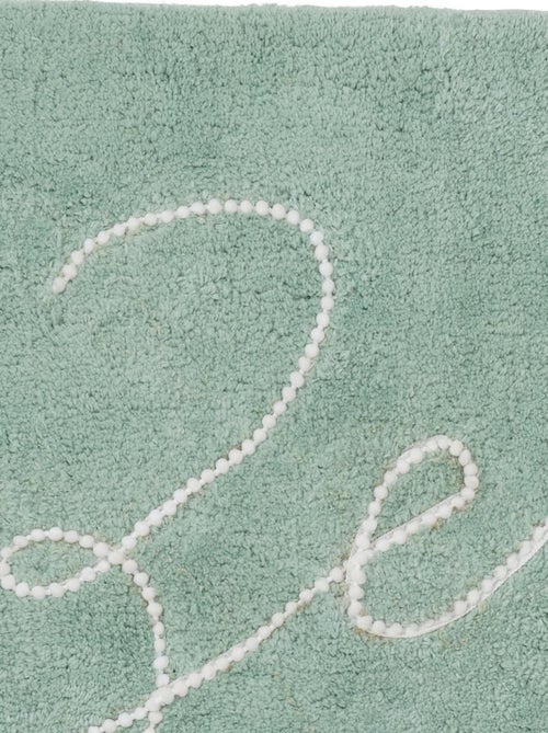 Guy Levasseur - Tapis de bain à texte 50x80 en coton - Kiabi Guy Levasseur - Tapis de bain à texte 50x80 en coton - Kiabi