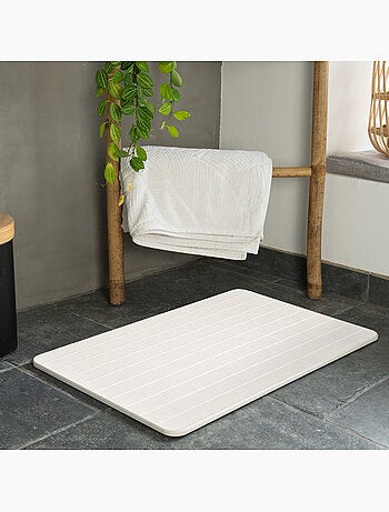 Guy levasseur - tapis de bain en pierre diatomite creusé