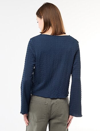 Haut col V en maille gaufrée avec boutons dorés