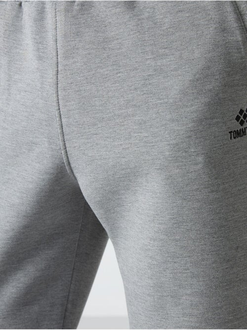 Heren jogger sweatbroek met smalle pijp tommy - Kiabi Heren jogger sweatbroek met smalle pijp tommy - Kiabi