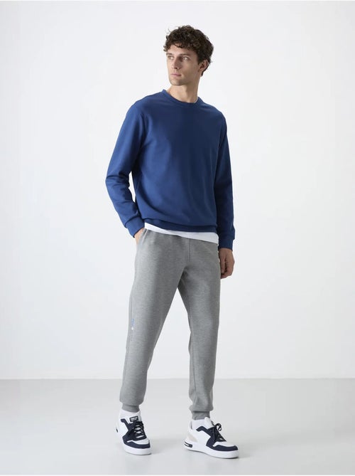 Heren jogger sweatbroek met smalle pijp tommy - Kiabi Heren jogger sweatbroek met smalle pijp tommy - Kiabi