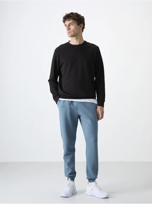 Heren jogger sweatbroek met smalle pijp tommy - Kiabi Heren jogger sweatbroek met smalle pijp tommy - Kiabi