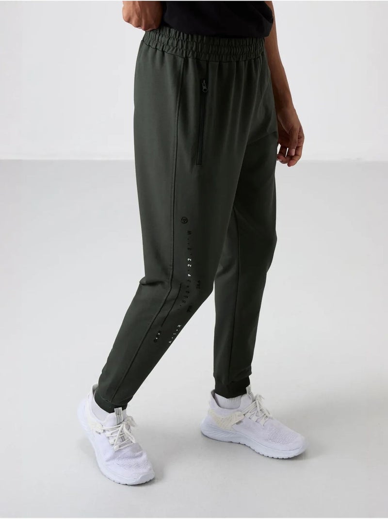 Heren joggingbroek, effen tommy Donkergroen - Kiabi