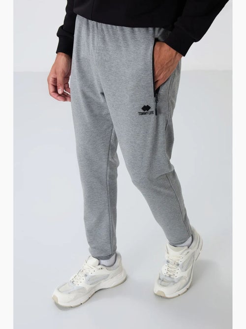 Heren joggingbroek met ritszak tommy - Kiabi Heren joggingbroek met ritszak tommy - Kiabi