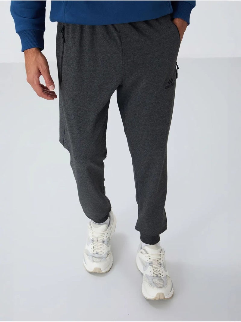 Heren joggingbroek met ritszak tommy Grijs Zwart - Kiabi
