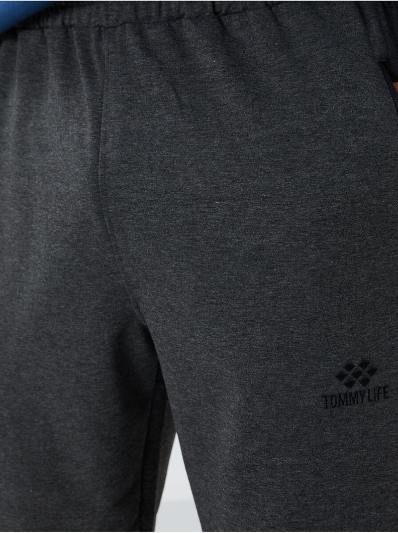 Heren joggingbroek met ritszak tommy Grijs Zwart - Kiabi