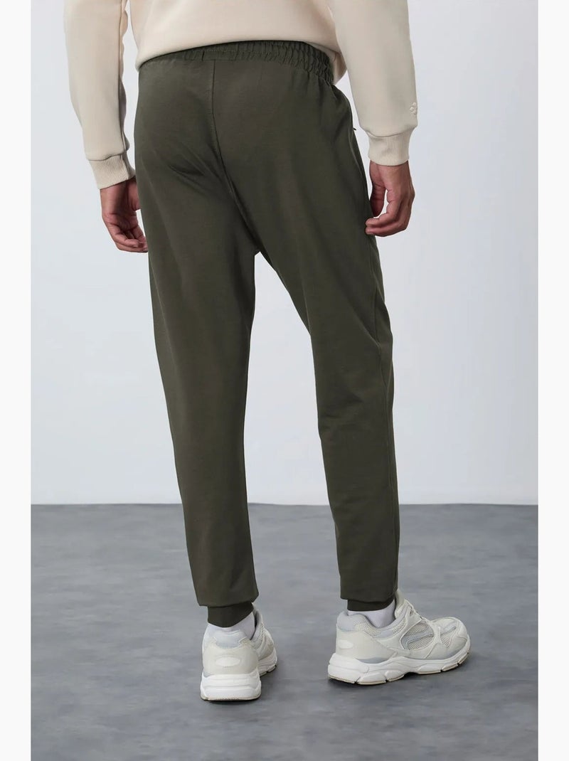 Heren joggingbroek met ritszak tommy Kakigroen - Kiabi