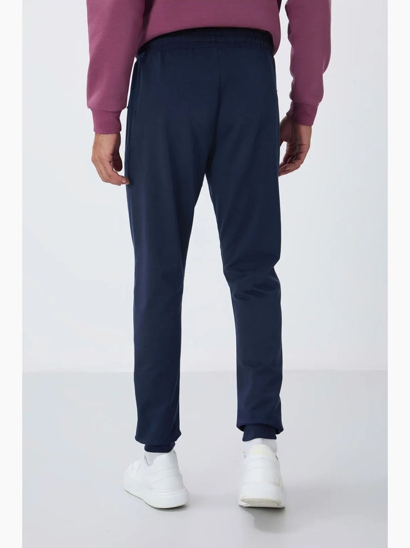 Heren joggingbroek met ritszak tommy Marineblauw - Kiabi