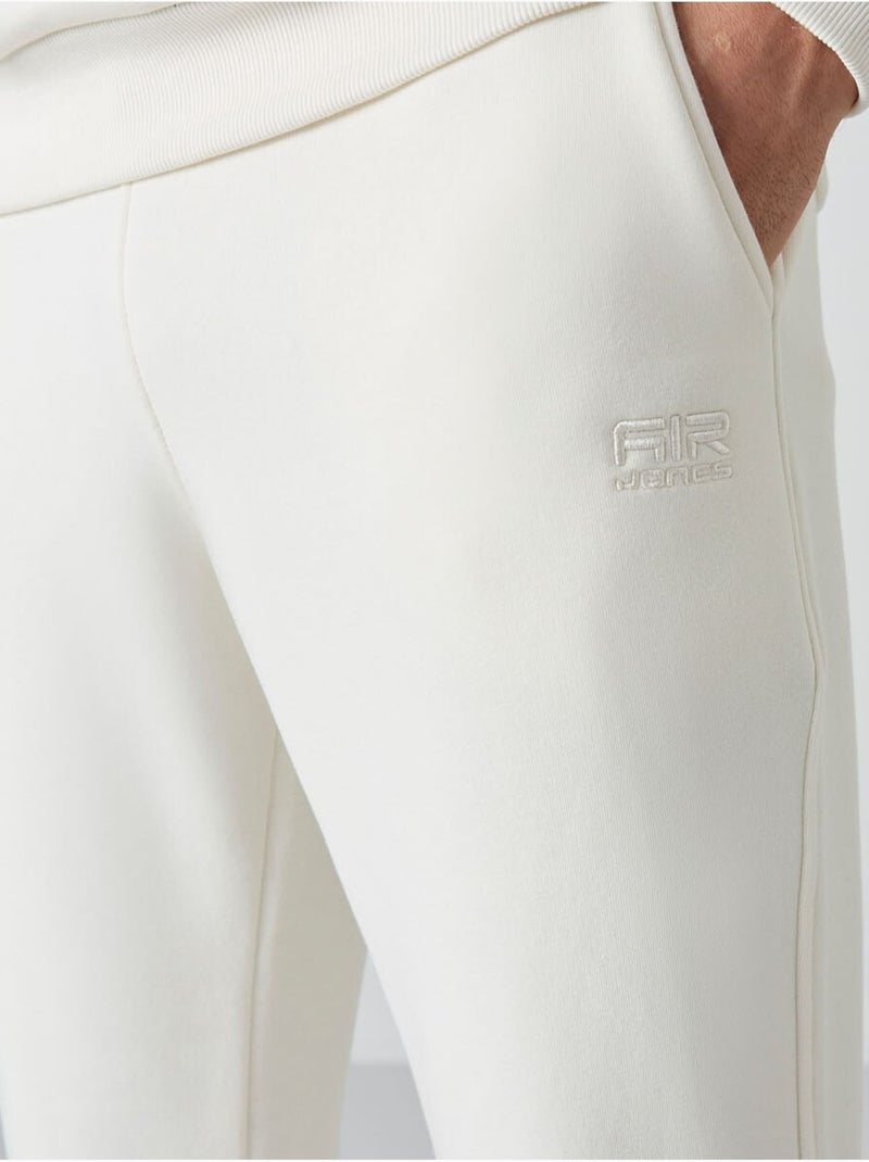 Heren set met sweatshirt en broek met ronde hals en lange mouwen tommy Gebroken wit - Kiabi