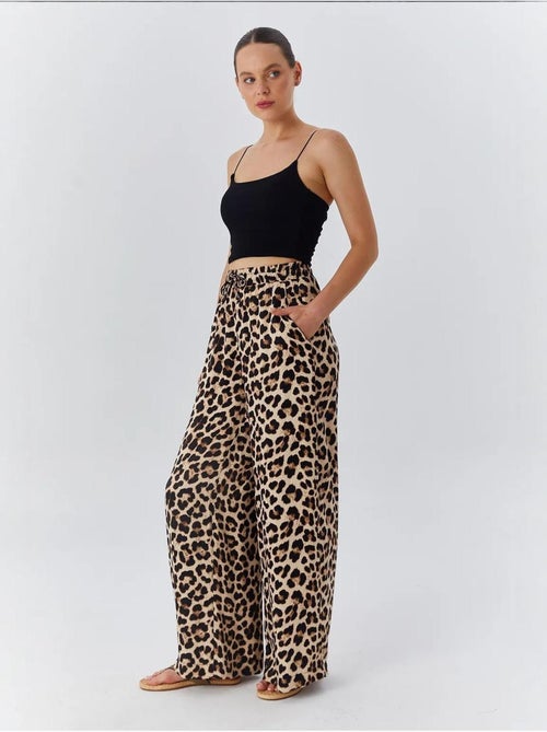 High-waist broek met luipaardprint en wijde pijpen mixray - Kiabi High-waist broek met luipaardprint en wijde pijpen mixray - Kiabi