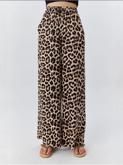 High-waist broek met luipaardprint en wijde pijpen mixray - Kiabi High-waist broek met luipaardprint en wijde pijpen mixray - Kiabi