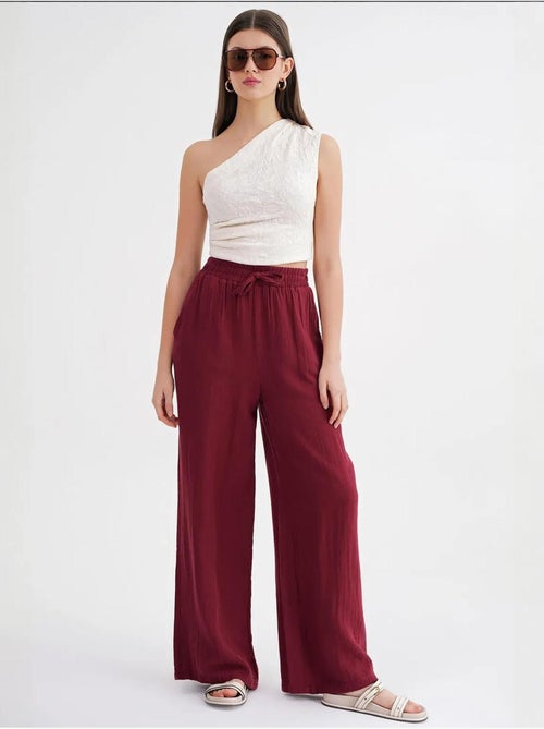 High waist broek van getextureerde mousselin mixray - Kiabi High waist broek van getextureerde mousselin mixray - Kiabi