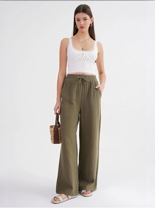 High waist broek van getextureerde mousselin mixray - Kiabi High waist broek van getextureerde mousselin mixray - Kiabi