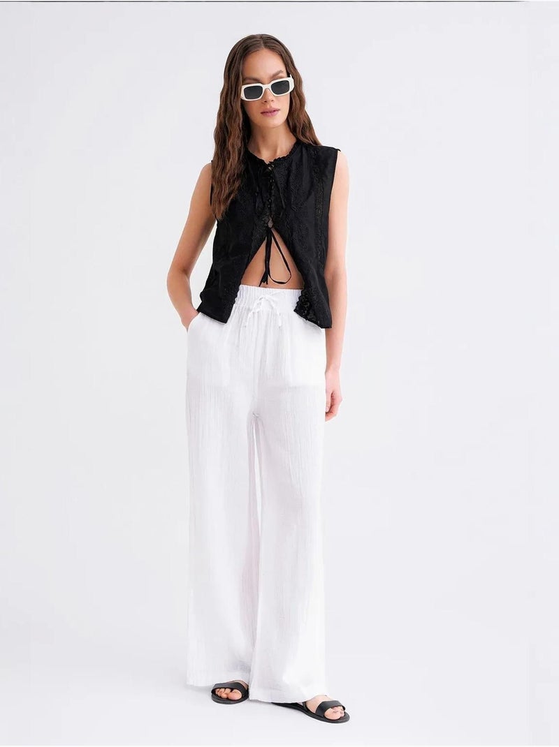 High waist broek van getextureerde mousselin mixray Wit - Kiabi