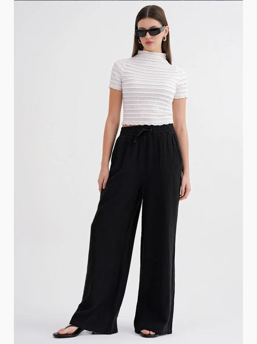 High waist broek van getextureerde mousselin mixray - Kiabi High waist broek van getextureerde mousselin mixray - Kiabi