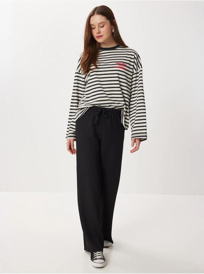 High-waist getextureerde broek met wijde pijpen istanbul Zwart - Kiabi