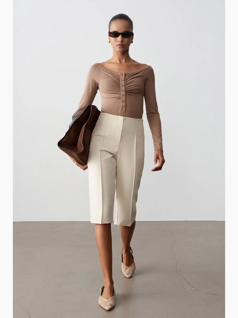 High-waist rechte capri shorts met split dilvin Crème - Kiabi