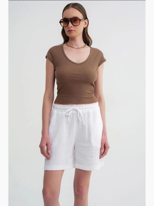 High-waist shorts met textuur en wijde pijpen mixray - Kiabi High-waist shorts met textuur en wijde pijpen mixray - Kiabi