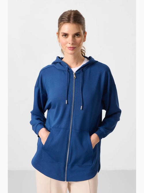 Hoodie tunique long oversize à capuche et zip tommy - Kiabi Hoodie tunique long oversize à capuche et zip tommy - Kiabi