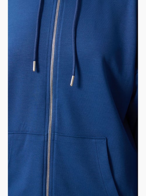 Hoodie tunique long oversize à capuche et zip tommy - Kiabi Hoodie tunique long oversize à capuche et zip tommy - Kiabi