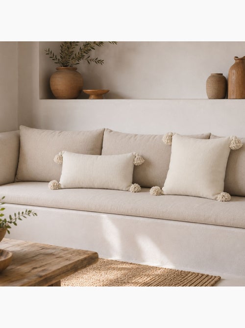 Housse de coussin en laine à pompons - Kiabi Housse de coussin en laine à pompons - Kiabi