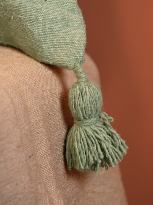 Housse de coussin en laine à pompons - Kiabi Housse de coussin en laine à pompons - Kiabi