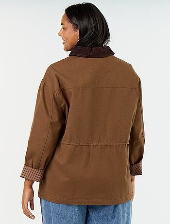 Jas van twill met ribfluwelen kraag