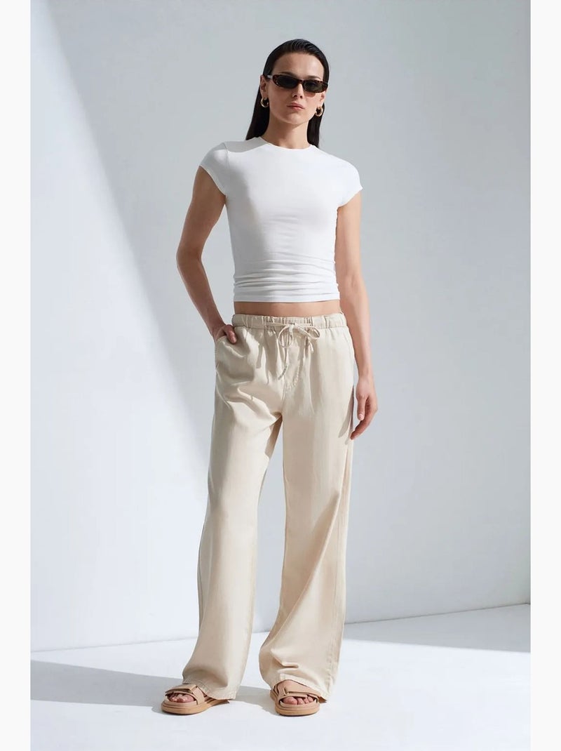 Jean en denim à taille mi-haute et jambe large dilvin Beige argile - Kiabi