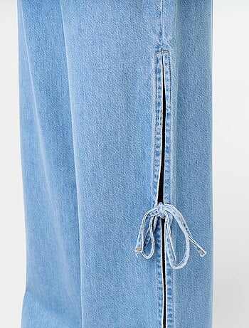 Jean large wide leg avec nœuds fantaisies à la base