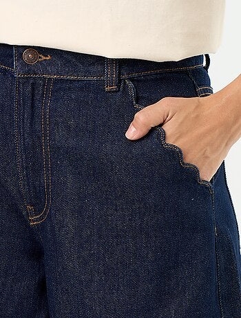 Jean wide leg avec poches découpées