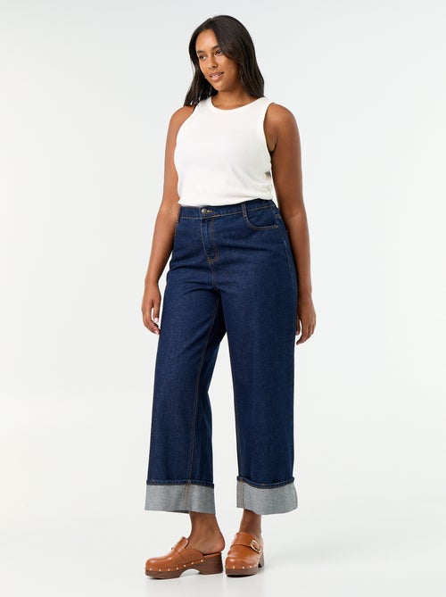 Jeans met wijde pasvorm en omgeslagen pijpen - Kiabi Jeans met wijde pasvorm en omgeslagen pijpen - Kiabi