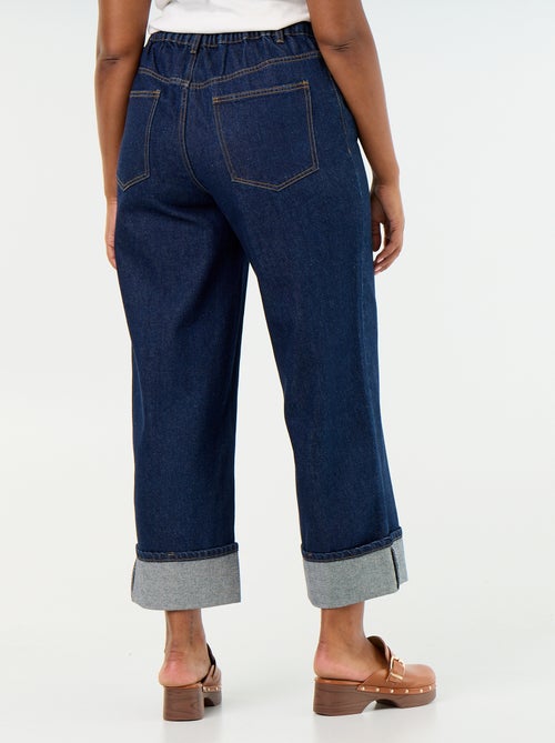 Jeans met wijde pasvorm en omgeslagen pijpen - Kiabi Jeans met wijde pasvorm en omgeslagen pijpen - Kiabi