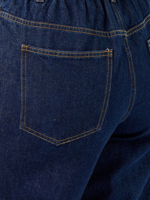 Jeans met wijde pasvorm en omgeslagen pijpen - Kiabi Jeans met wijde pasvorm en omgeslagen pijpen - Kiabi