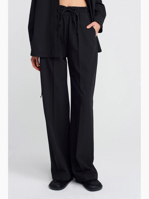 Jersey broek met wijde pijp dilvin - Kiabi Jersey broek met wijde pijp dilvin - Kiabi