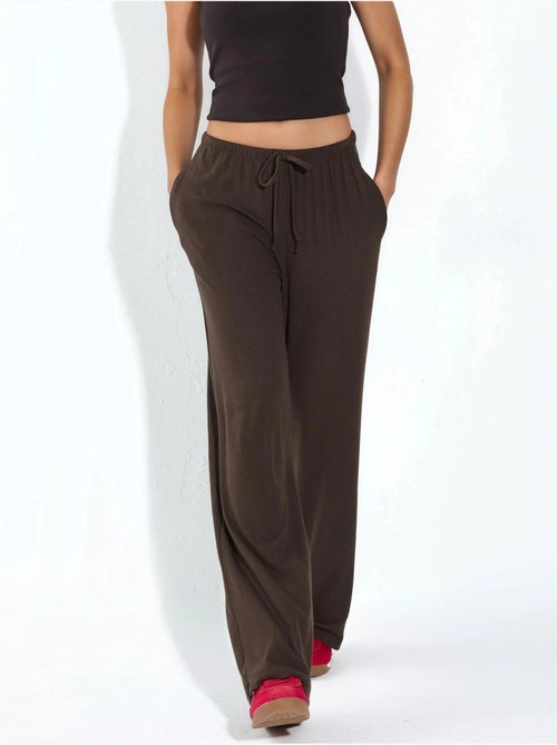 Jersey broek met wijde pijpen busem - Kiabi Jersey broek met wijde pijpen busem - Kiabi