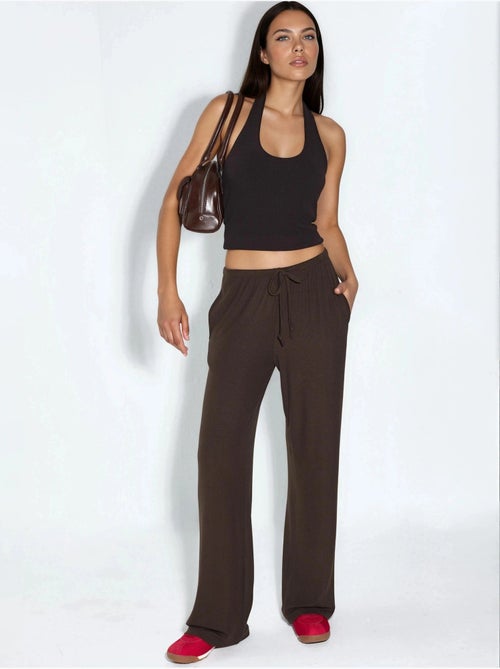 Jersey broek met wijde pijpen busem - Kiabi Jersey broek met wijde pijpen busem - Kiabi