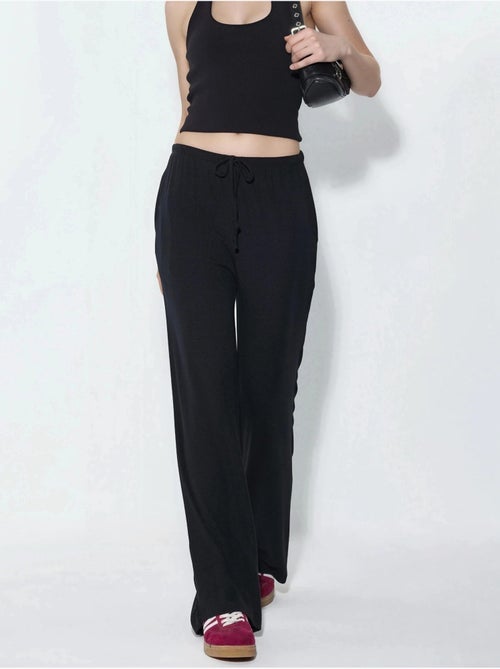 Jersey broek met wijde pijpen busem - Kiabi Jersey broek met wijde pijpen busem - Kiabi