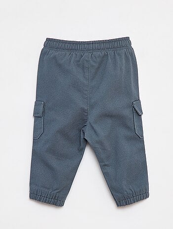 Jogg-broek van keperstof met zakken met klepje