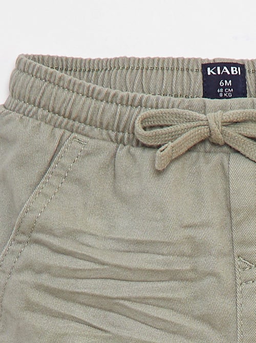 Jogg-broek van keperstof met zakken met klepje - Kiabi Jogg-broek van keperstof met zakken met klepje - Kiabi