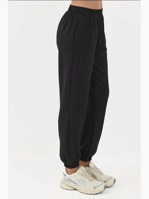 Joggerbroek met elastische taille en modale touch hiccup - Kiabi Joggerbroek met elastische taille en modale touch hiccup - Kiabi