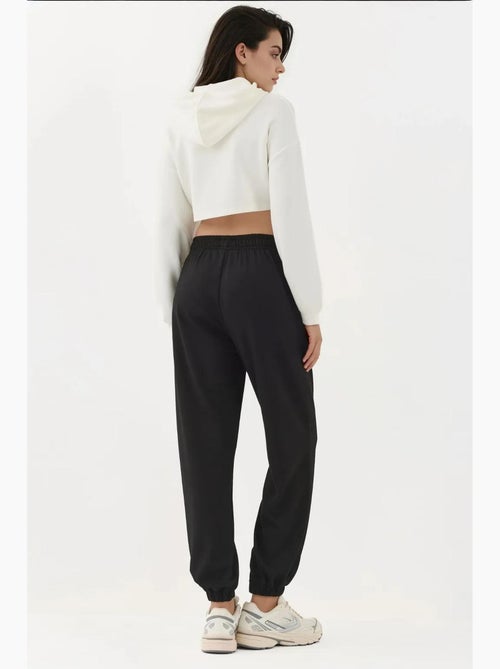 Joggerbroek met elastische taille en modale touch hiccup - Kiabi Joggerbroek met elastische taille en modale touch hiccup - Kiabi