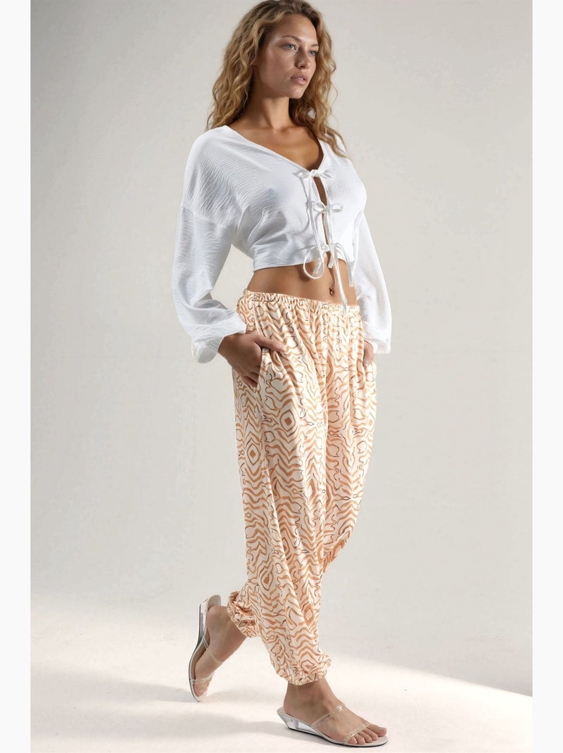 Joggerbroek met zebraprint en lage taille hiccup Beige - Kiabi