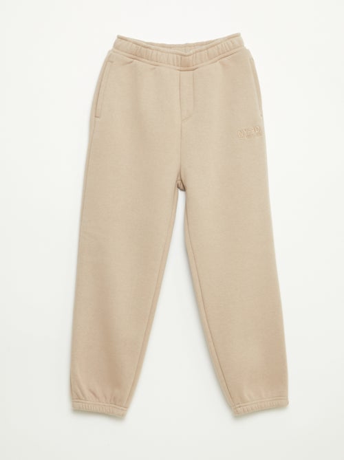 Jogging chaud uni avec doublure polaire - Kiabi Jogging chaud uni avec doublure polaire - Kiabi