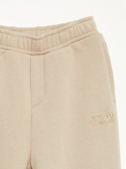 Jogging chaud uni avec doublure polaire - Kiabi Jogging chaud uni avec doublure polaire - Kiabi