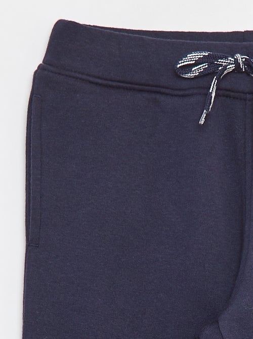 Jogging chiné avec ceinture ajustable - Kiabi Jogging chiné avec ceinture ajustable - Kiabi