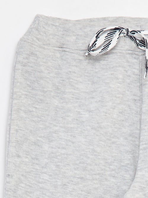 Jogging chiné avec ceinture ajustable - Kiabi Jogging chiné avec ceinture ajustable - Kiabi