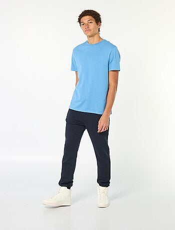 Jogging en molleton gratté avec 2 poches zippées